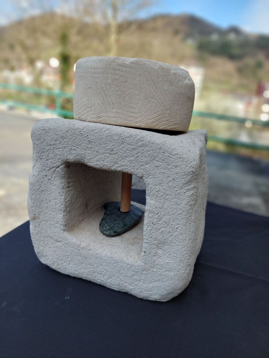 Stone base with wooden drill