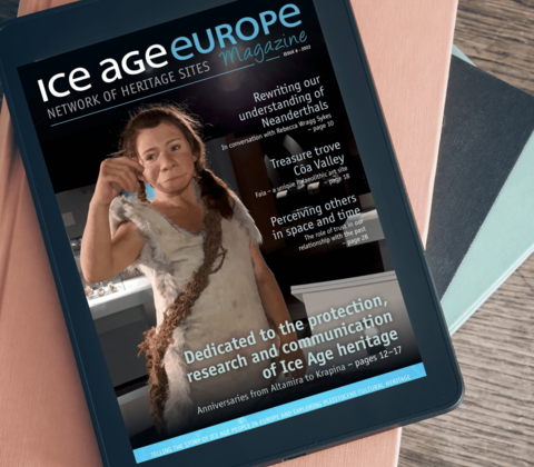 Ice Age Europe Magazine Cover visible on a tablet on a table