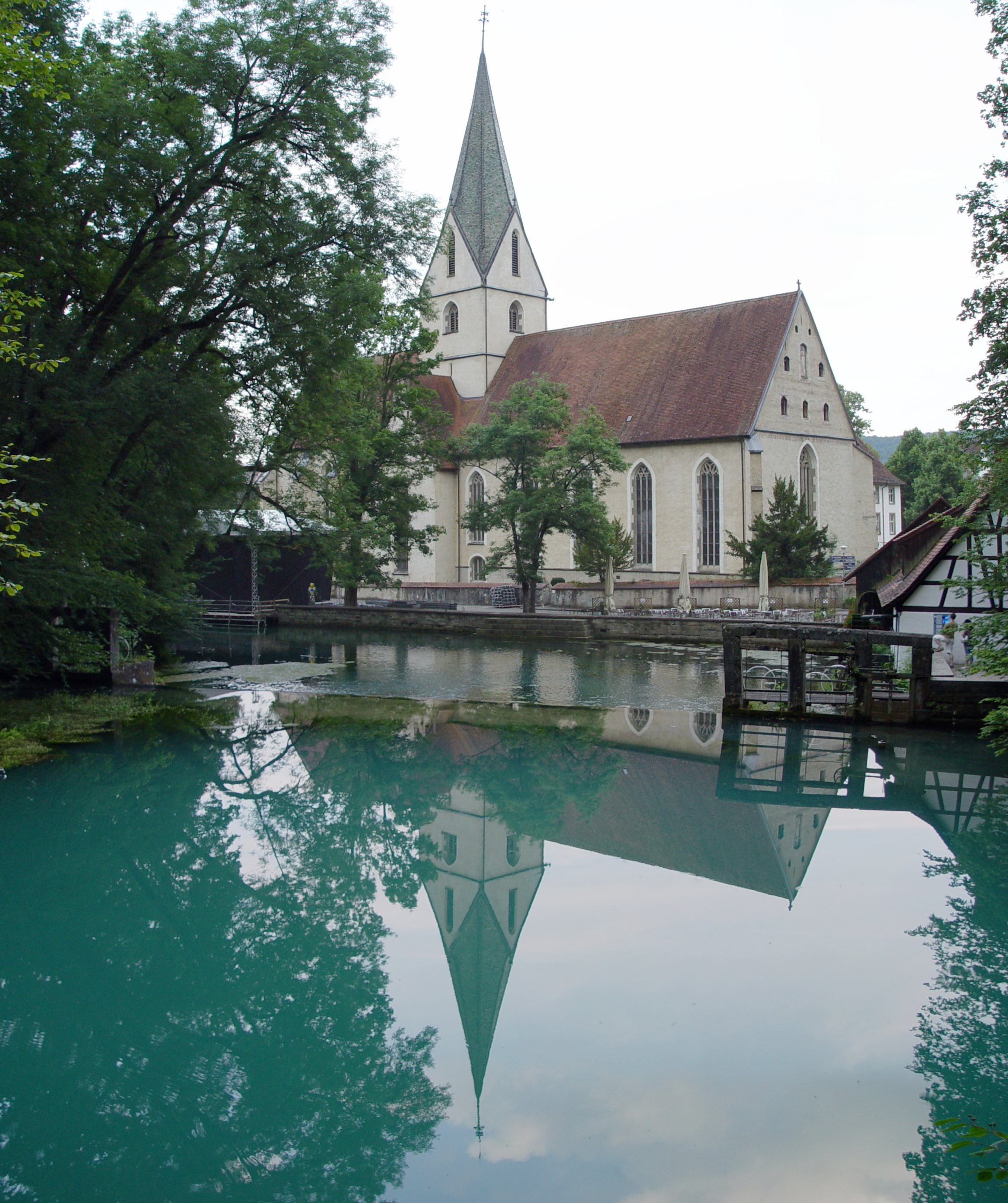 View of karstic spring Blautopf and monastery church in the background