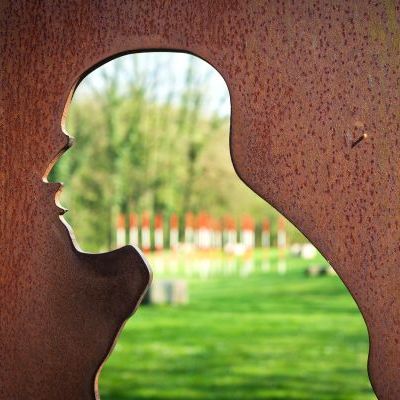 Silhouette of a Neanderthal Head Made of Steel